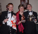 Bridget and her sons with THEIR trophies