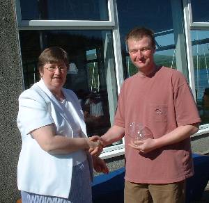 Handicap winner Andrew Elliot with Commodore Jose Hodgkins