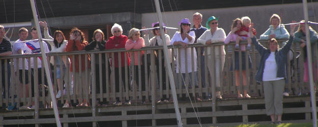 The crowd of onlookers (together with cow girls)