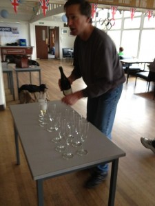 Alan prepares the champagne